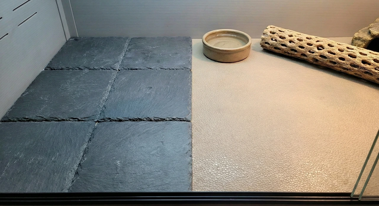 Two safe bearded dragon substrate options side by side: dark grey slate tile on the left, tan shelf liner on the right.